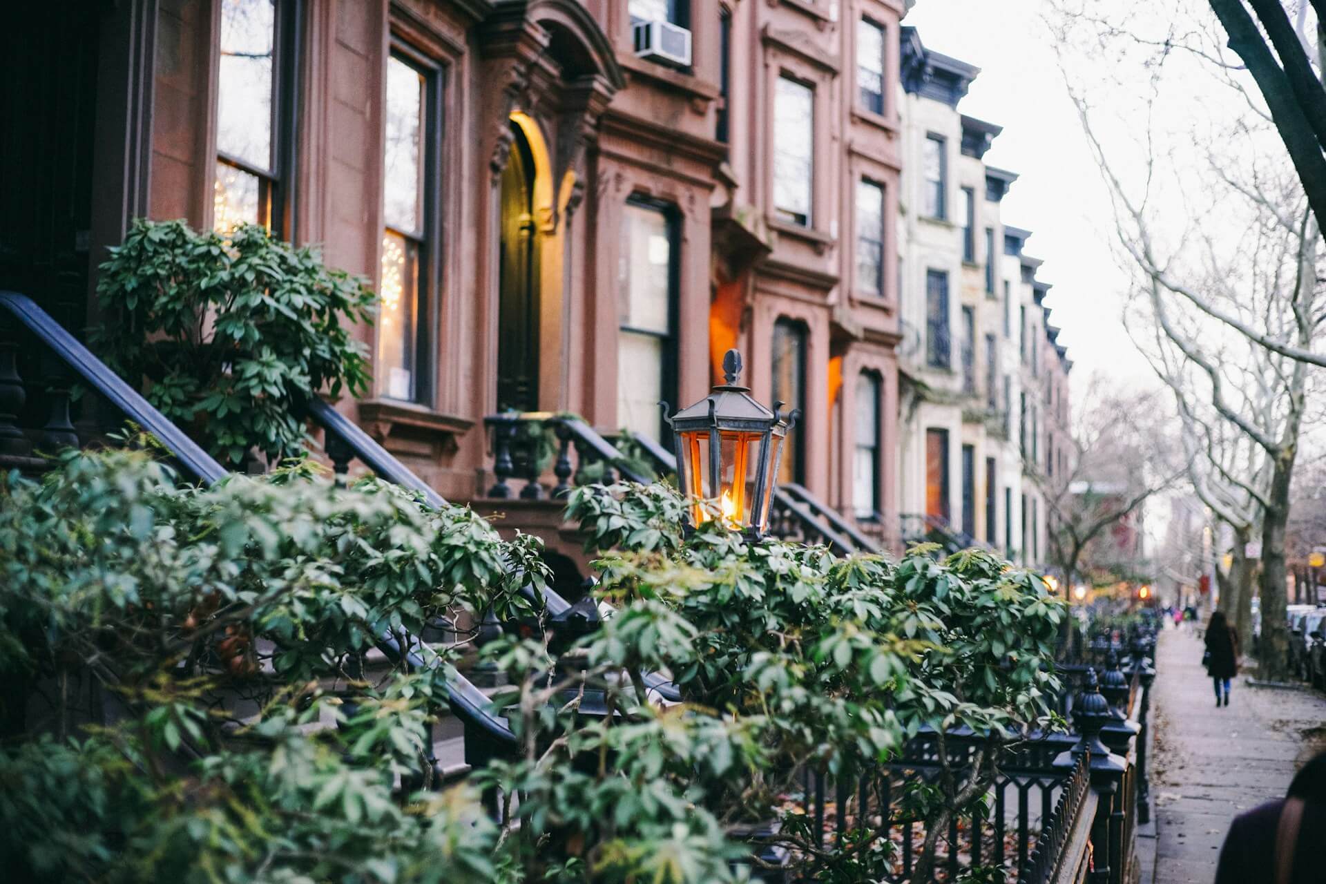 A series of homes lining a street in Park Slope Brooklyn